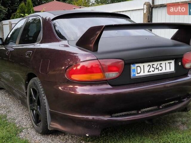 Червоний Мазда Кседос 6, об'ємом двигуна 2 л та пробігом 394 тис. км за 2999 $, фото 10 на Automoto.ua