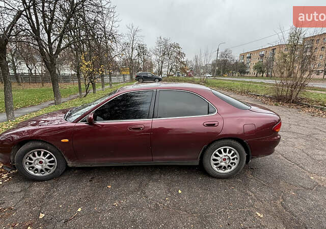 Красный Мазда Кседос 6, объемом двигателя 2 л и пробегом 260 тыс. км за 2800 $, фото 2 на Automoto.ua