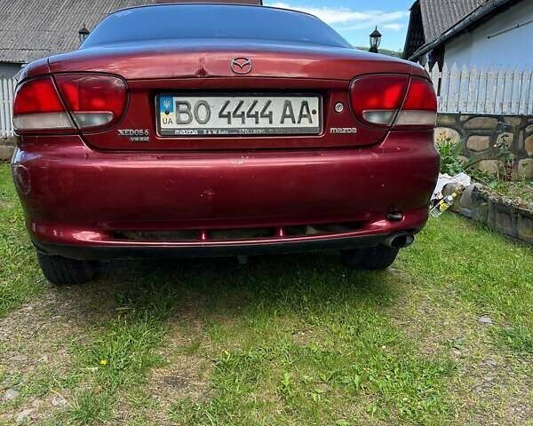 Красный Мазда Кседос 6, объемом двигателя 2 л и пробегом 430 тыс. км за 1350 $, фото 7 на Automoto.ua