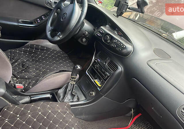 Красный Мазда Кседос 6, объемом двигателя 2 л и пробегом 2 тыс. км за 1800 $, фото 3 на Automoto.ua