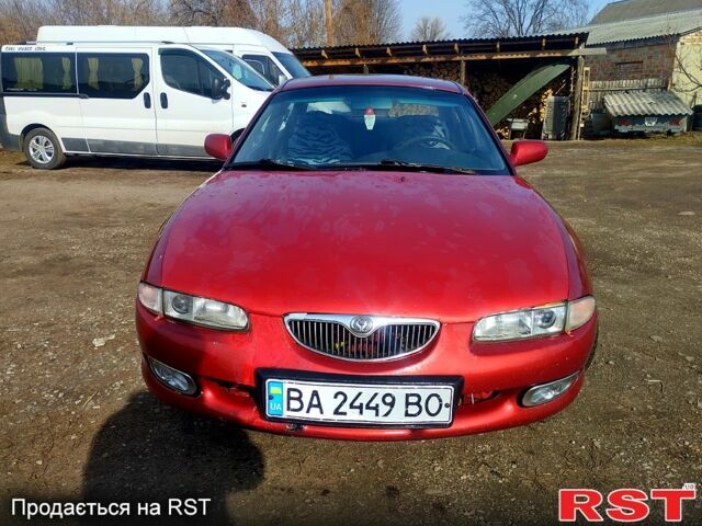 Красный Мазда Кседос 6, объемом двигателя 2 л и пробегом 250 тыс. км за 2100 $, фото 1 на Automoto.ua