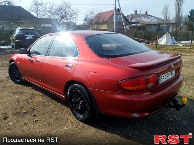Красный Мазда Кседос 6, объемом двигателя 2 л и пробегом 250 тыс. км за 2100 $, фото 5 на Automoto.ua