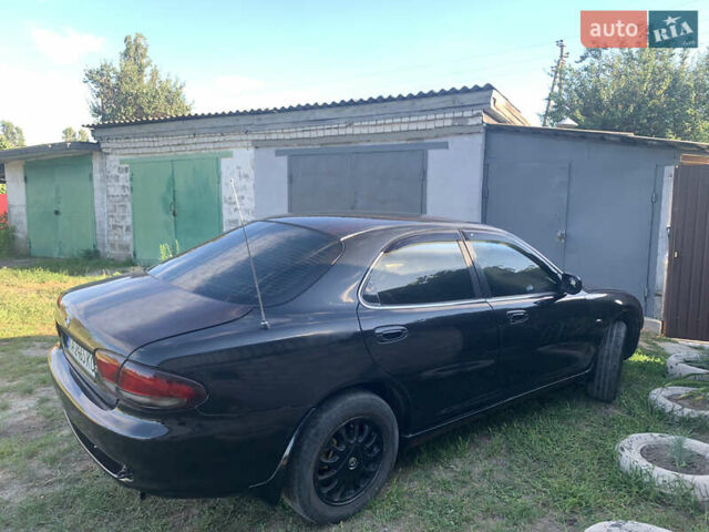 Мазда Кседос 6, об'ємом двигуна 2 л та пробігом 350 тис. км за 2800 $, фото 7 на Automoto.ua