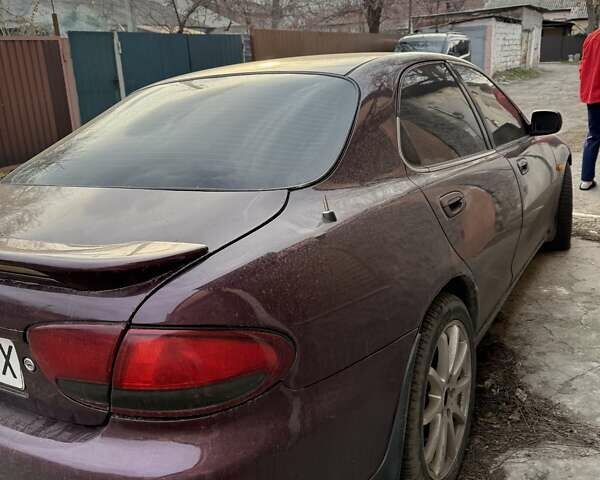 Мазда Кседос 6, объемом двигателя 2 л и пробегом 433 тыс. км за 700 $, фото 4 на Automoto.ua