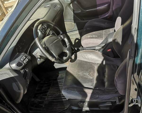 Мазда Кседос 6, объемом двигателя 2 л и пробегом 274 тыс. км за 1000 $, фото 11 на Automoto.ua