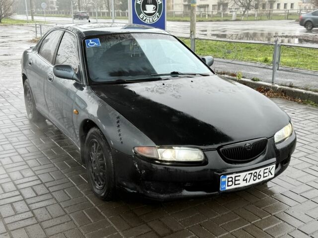 Серый Мазда Кседос 6, объемом двигателя 2 л и пробегом 250 тыс. км за 999 $, фото 2 на Automoto.ua