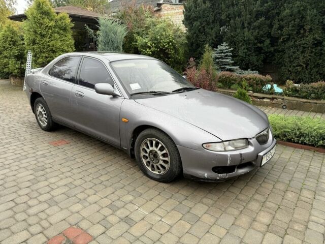 Серый Мазда Кседос 6, объемом двигателя 0 л и пробегом 300 тыс. км за 900 $, фото 1 на Automoto.ua