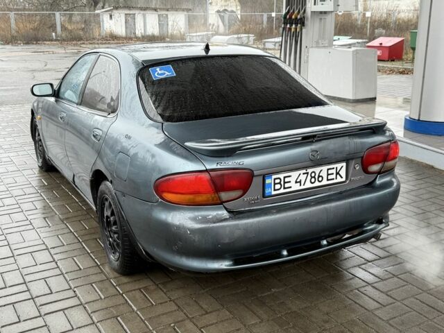 Серый Мазда Кседос 6, объемом двигателя 2 л и пробегом 250 тыс. км за 999 $, фото 5 на Automoto.ua