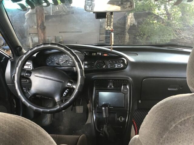 Сірий Мазда Кседос 6, об'ємом двигуна 2 л та пробігом 465 тис. км за 1800 $, фото 7 на Automoto.ua