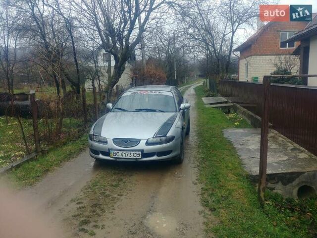 Серый Мазда Кседос 6, объемом двигателя 2 л и пробегом 375 тыс. км за 1700 $, фото 5 на Automoto.ua