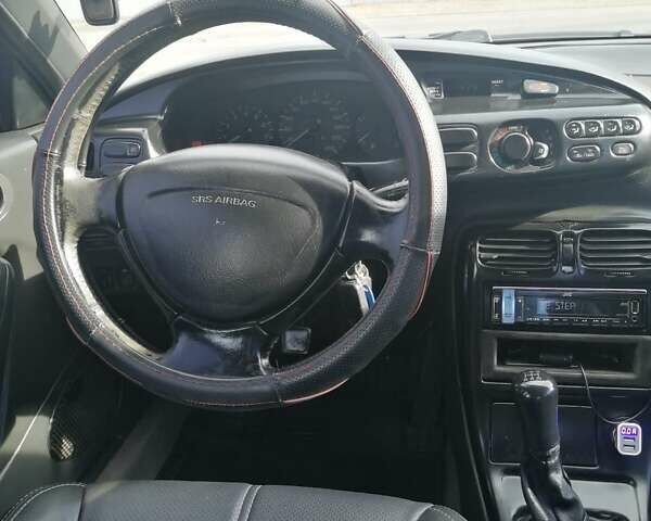 Серый Мазда Кседос 6, объемом двигателя 2 л и пробегом 372 тыс. км за 1700 $, фото 5 на Automoto.ua
