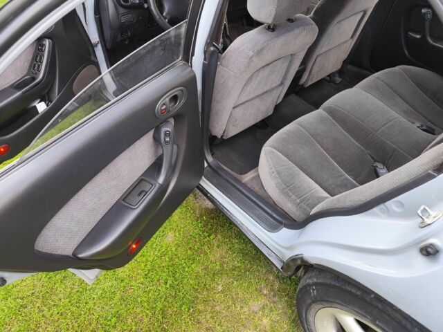 Серый Мазда Кседос 6, объемом двигателя 1.6 л и пробегом 343 тыс. км за 1800 $, фото 7 на Automoto.ua