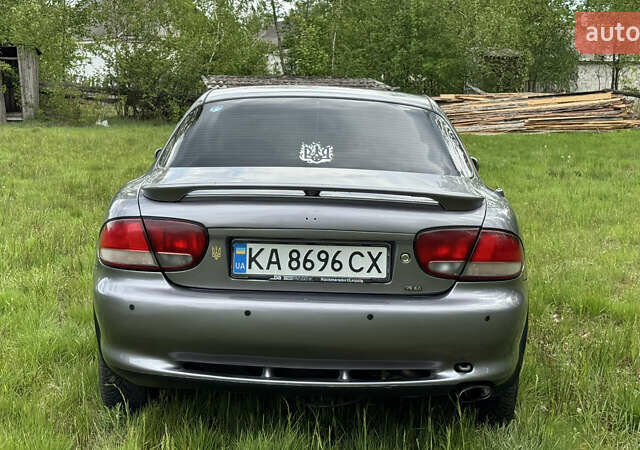 Серый Мазда Кседос 6, объемом двигателя 2 л и пробегом 340 тыс. км за 1800 $, фото 4 на Automoto.ua