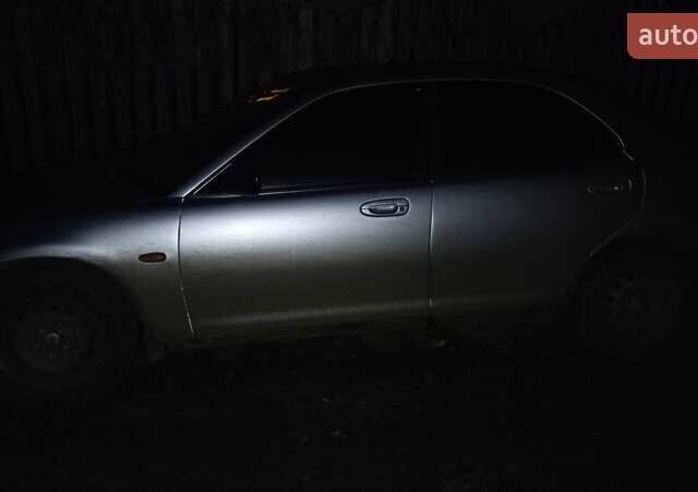 Сірий Мазда Кседос 6, об'ємом двигуна 2 л та пробігом 203 тис. км за 1500 $, фото 2 на Automoto.ua