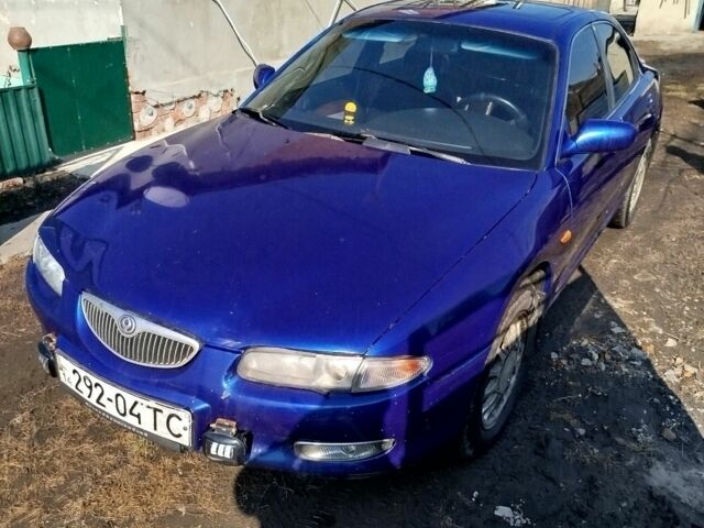 Синій Мазда Кседос 6, об'ємом двигуна 2 л та пробігом 280 тис. км за 2000 $, фото 4 на Automoto.ua