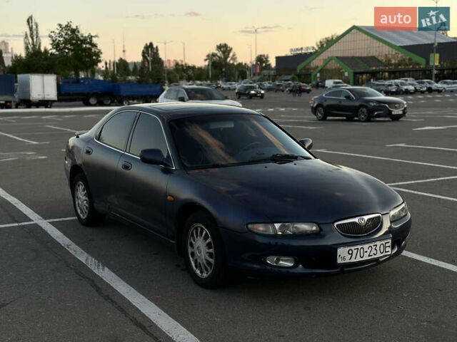 Синий Мазда Кседос 6, объемом двигателя 2 л и пробегом 558 тыс. км за 1499 $, фото 4 на Automoto.ua