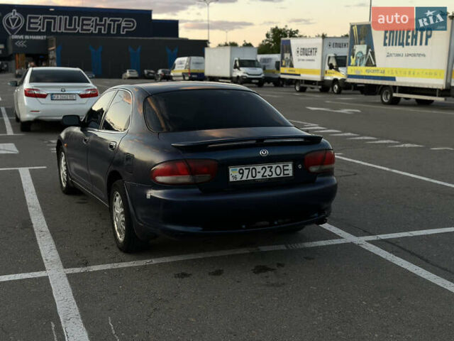 Синий Мазда Кседос 6, объемом двигателя 2 л и пробегом 558 тыс. км за 1499 $, фото 3 на Automoto.ua