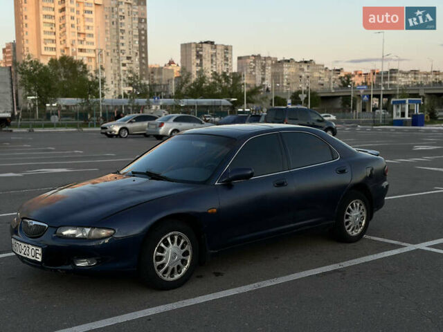 Синий Мазда Кседос 6, объемом двигателя 2 л и пробегом 558 тыс. км за 1499 $, фото 2 на Automoto.ua