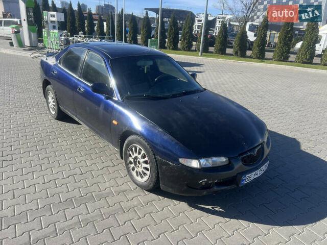 Синій Мазда Кседос 6, об'ємом двигуна 2 л та пробігом 325 тис. км за 920 $, фото 6 на Automoto.ua