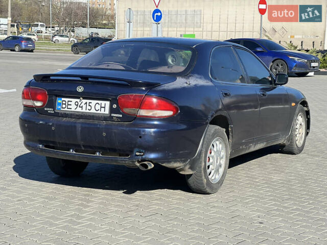 Синій Мазда Кседос 6, об'ємом двигуна 2 л та пробігом 325 тис. км за 920 $, фото 3 на Automoto.ua