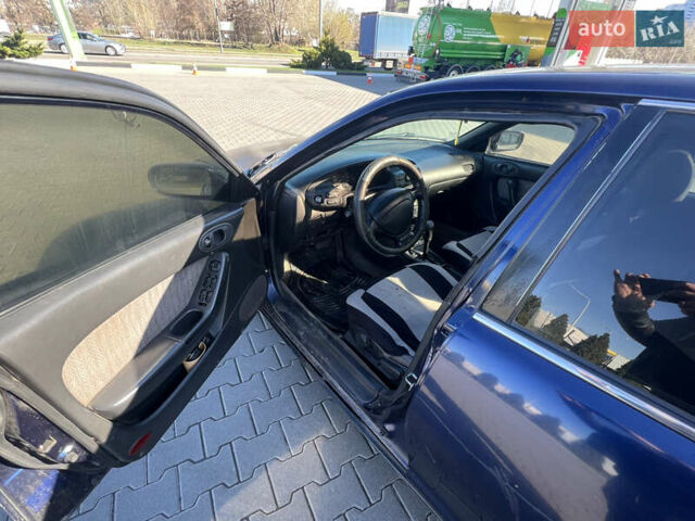 Синій Мазда Кседос 6, об'ємом двигуна 2 л та пробігом 325 тис. км за 920 $, фото 9 на Automoto.ua
