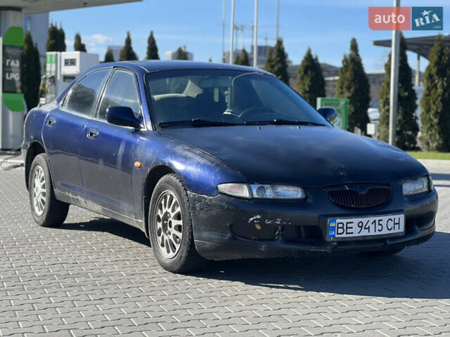 Синій Мазда Кседос 6, об'ємом двигуна 2 л та пробігом 325 тис. км за 920 $, фото 2 на Automoto.ua