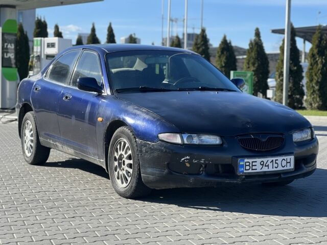 Синий Мазда Кседос 6, объемом двигателя 2 л и пробегом 325 тыс. км за 870 $, фото 2 на Automoto.ua
