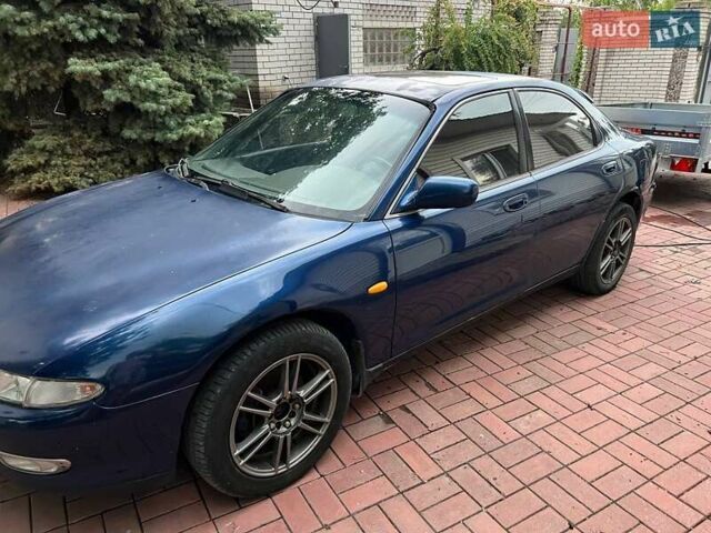 Синий Мазда Кседос 6, объемом двигателя 2 л и пробегом 150 тыс. км за 2000 $, фото 3 на Automoto.ua