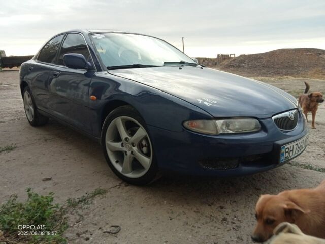 Синий Мазда Кседос 6, объемом двигателя 2 л и пробегом 245 тыс. км за 1800 $, фото 6 на Automoto.ua