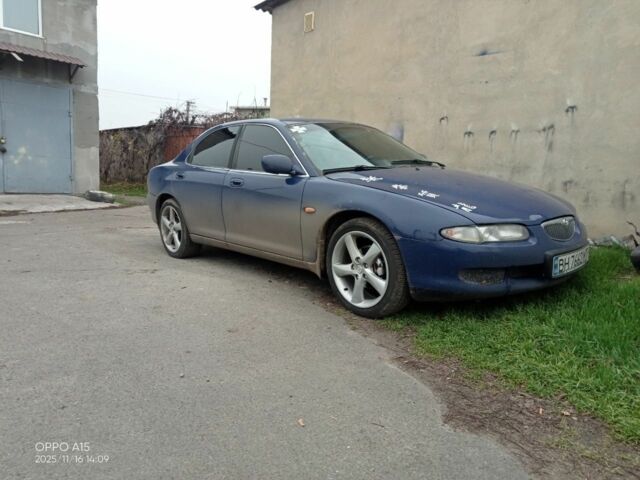 Синий Мазда Кседос 6, объемом двигателя 2 л и пробегом 245 тыс. км за 1800 $, фото 2 на Automoto.ua