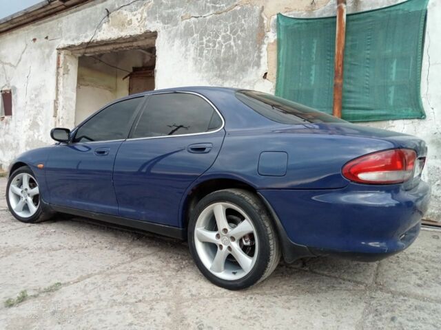 Синий Мазда Кседос 6, объемом двигателя 2 л и пробегом 245 тыс. км за 1800 $, фото 3 на Automoto.ua