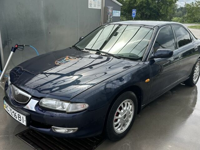 Синій Мазда Кседос 6, об'ємом двигуна 2 л та пробігом 380 тис. км за 1500 $, фото 10 на Automoto.ua