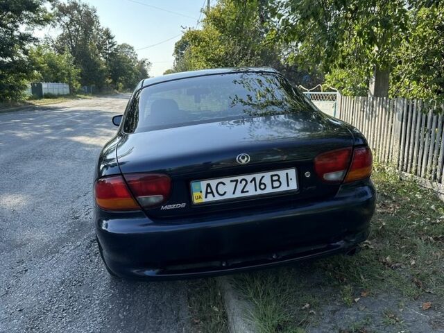 Синій Мазда Кседос 6, об'ємом двигуна 2 л та пробігом 380 тис. км за 1500 $, фото 2 на Automoto.ua