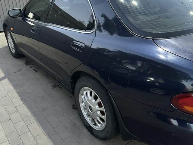 Синій Мазда Кседос 6, об'ємом двигуна 2 л та пробігом 380 тис. км за 1500 $, фото 17 на Automoto.ua