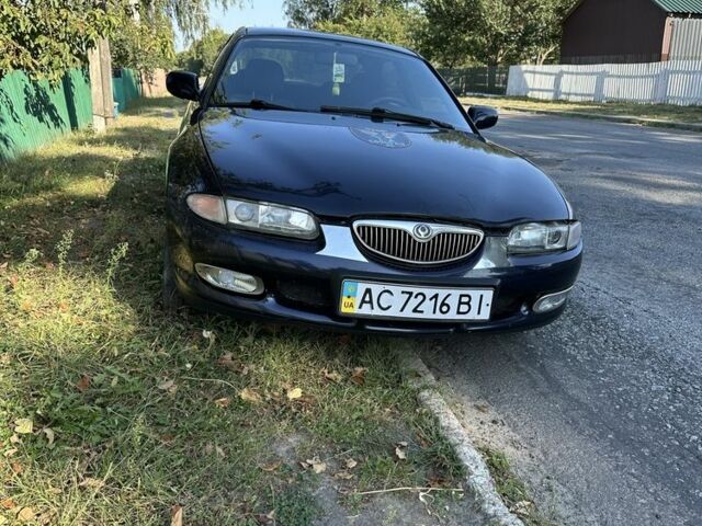 Синій Мазда Кседос 6, об'ємом двигуна 2 л та пробігом 380 тис. км за 1500 $, фото 4 на Automoto.ua