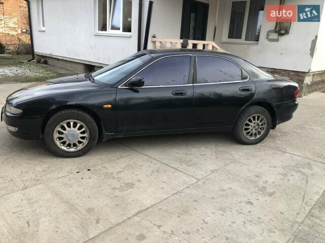 Синий Мазда Кседос 6, объемом двигателя 2 л и пробегом 300 тыс. км за 1350 $, фото 10 на Automoto.ua