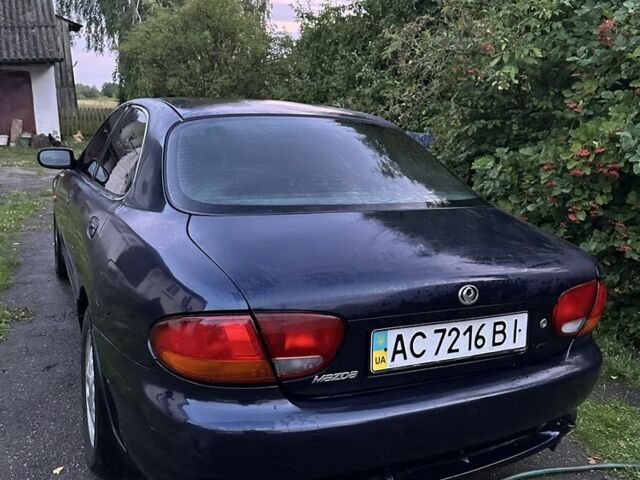 Синій Мазда Кседос 6, об'ємом двигуна 2 л та пробігом 380 тис. км за 1500 $, фото 16 на Automoto.ua