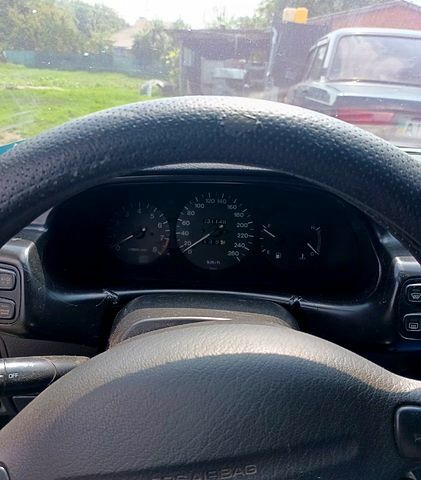 Синій Мазда Кседос 6, об'ємом двигуна 2 л та пробігом 231 тис. км за 1500 $, фото 3 на Automoto.ua