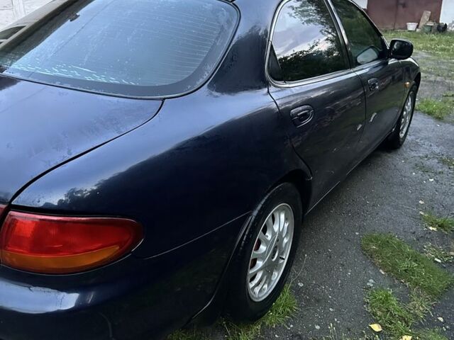 Синій Мазда Кседос 6, об'ємом двигуна 2 л та пробігом 380 тис. км за 1500 $, фото 15 на Automoto.ua