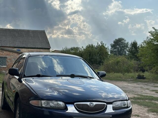 Синій Мазда Кседос 6, об'ємом двигуна 2 л та пробігом 380 тис. км за 1500 $, фото 22 на Automoto.ua