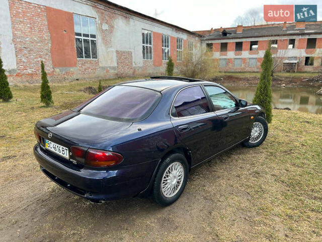 Синий Мазда Кседос 6, объемом двигателя 2 л и пробегом 300 тыс. км за 2250 $, фото 30 на Automoto.ua