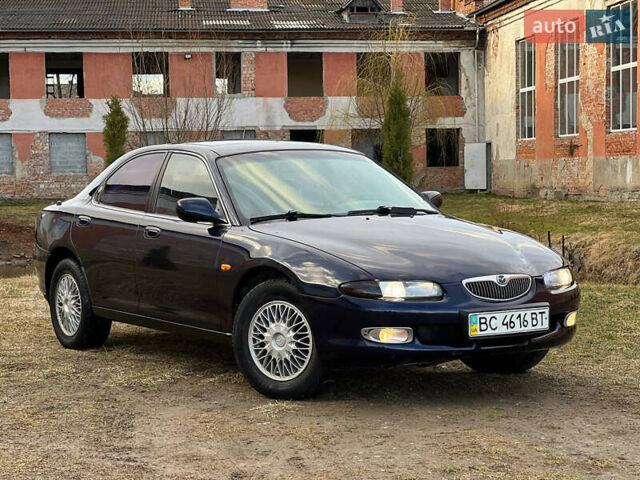 Синий Мазда Кседос 6, объемом двигателя 2 л и пробегом 300 тыс. км за 2250 $, фото 4 на Automoto.ua