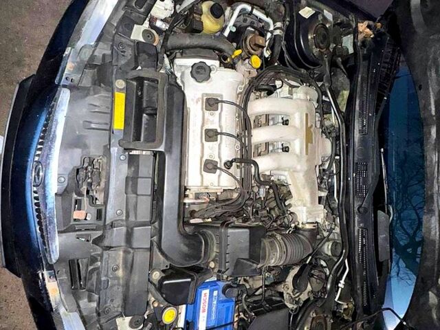 Синий Мазда Кседос 6, объемом двигателя 2 л и пробегом 134 тыс. км за 1300 $, фото 2 на Automoto.ua