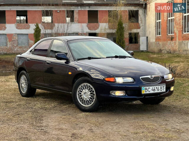 Синий Мазда Кседос 6, объемом двигателя 2 л и пробегом 300 тыс. км за 2250 $, фото 5 на Automoto.ua