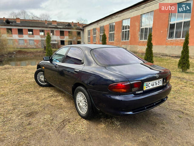 Синий Мазда Кседос 6, объемом двигателя 2 л и пробегом 300 тыс. км за 2250 $, фото 23 на Automoto.ua