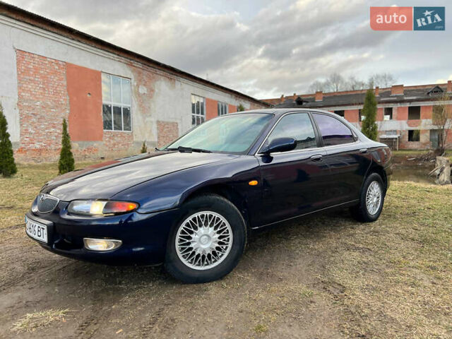 Синий Мазда Кседос 6, объемом двигателя 2 л и пробегом 300 тыс. км за 2250 $, фото 18 на Automoto.ua