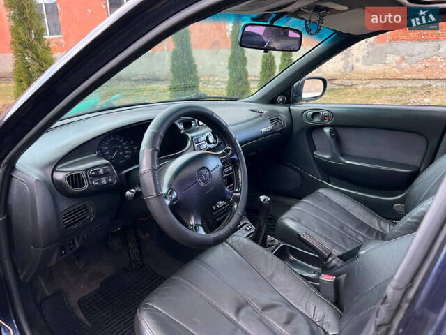 Синий Мазда Кседос 6, объемом двигателя 2 л и пробегом 300 тыс. км за 2250 $, фото 37 на Automoto.ua