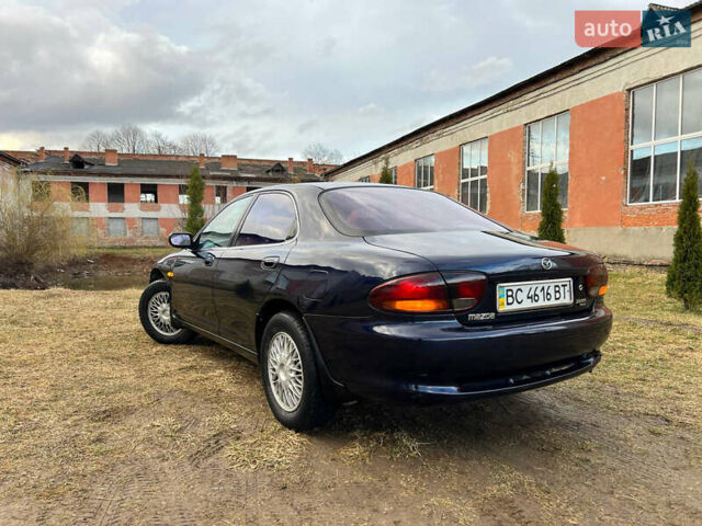 Синий Мазда Кседос 6, объемом двигателя 2 л и пробегом 300 тыс. км за 2250 $, фото 22 на Automoto.ua