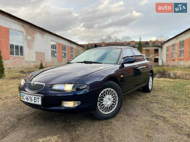 Синий Мазда Кседос 6, объемом двигателя 2 л и пробегом 300 тыс. км за 2250 $, фото 19 на Automoto.ua