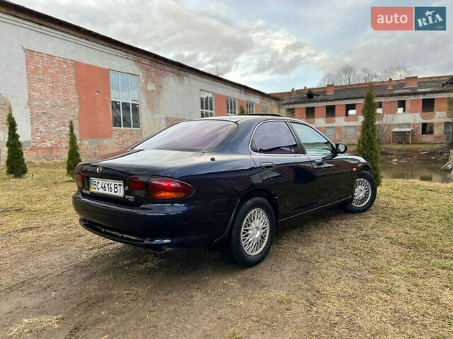 Синий Мазда Кседос 6, объемом двигателя 2 л и пробегом 300 тыс. км за 2250 $, фото 29 на Automoto.ua